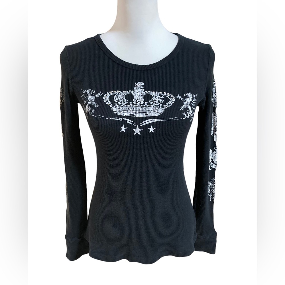Love Culture women’s long sleeve black ribbed top. Bejeweled queen’s crown.